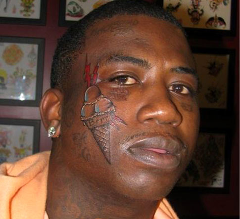 gucci tattoo on face. Gucci Mane Explains Reasoning